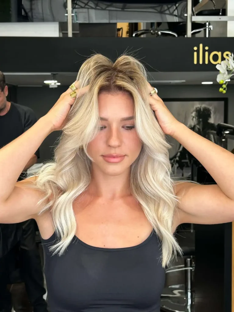 Airtouch Balayage technique creating sun-kissed hair